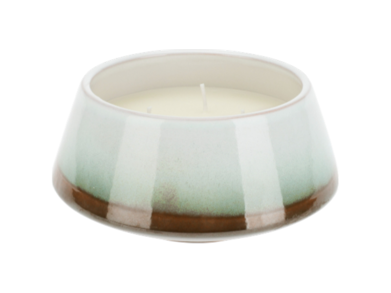 Scented candle in ceramic pot